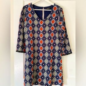 Elegant v-neck dress with fun sleeve detail.